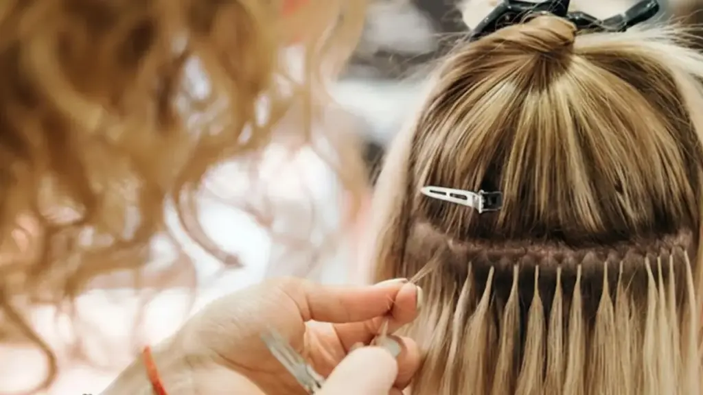 How to Install I-Tip Hair Extensions? 3 how to apply i tip hair extensions with heat