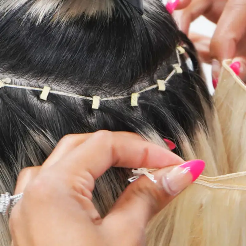 what is hand tied weft extensions