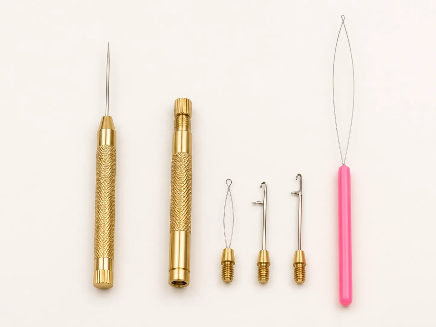 Alpha Hair hook needles and bead threaders in three styles — gold-metal fixed needle, gold-metal interchangeable-tip threader, and pink plastic-handle loop threader